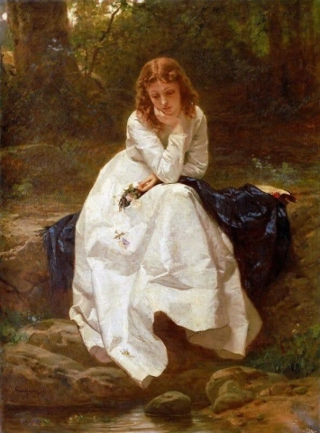 Ung kvinne sitter ved en bekk