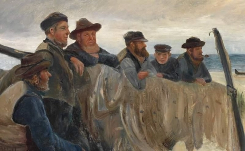 Een groep vissers kijkt uit over de zee