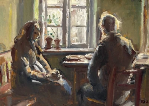 窓の前のテーブルに座るスカーゲンの老夫婦