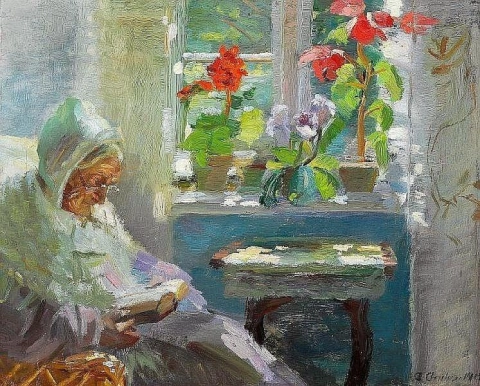 Mrs. Br Ndum Reading In Her Sitting-room