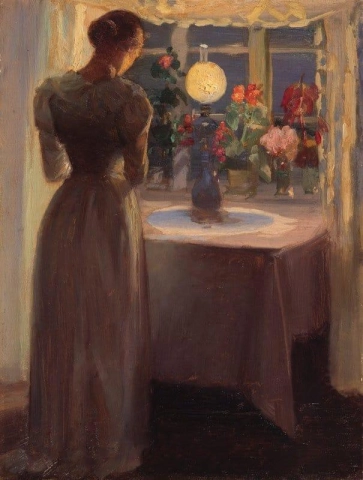 Young Girl In Front Of A Lighted Lamp
