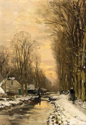 Una figura caminando por un canal en invierno