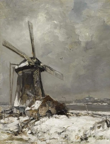 Eine Windmühle in einer schneebedeckten Landschaft