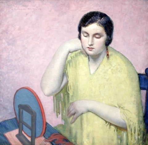 Dama sentada en un tocador hacia 1905