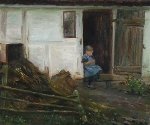 Ein kleines Mädchen, das auf einer Türschwelle sitzt