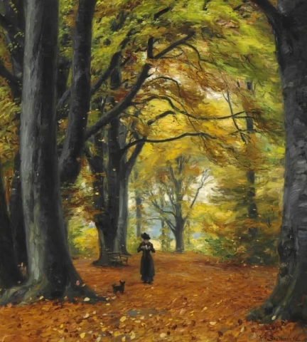 En ung kvinna går med hunden i en höstskog 1910