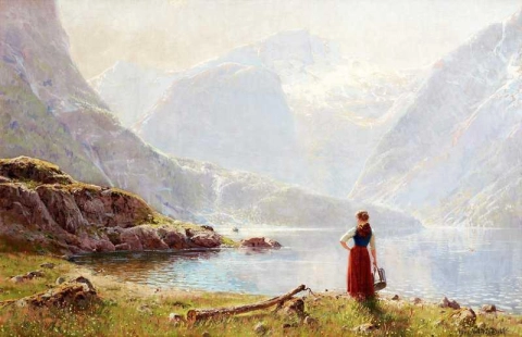 Een jong meisje bij een fjord
