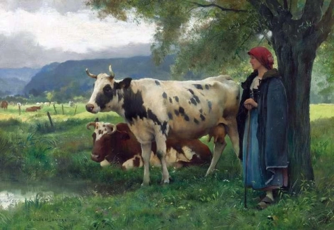 소와 함께 있는 농부 여인