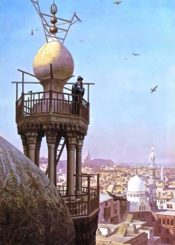 En muezzin som kaller fra toppen av en minaret De trofaste til bønn