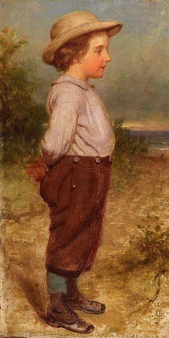 一个小男孩在海边的肖像