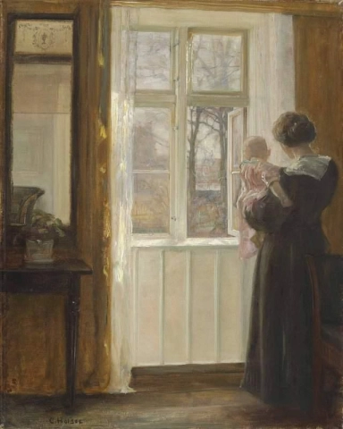 En mor og et barn ved et vindu