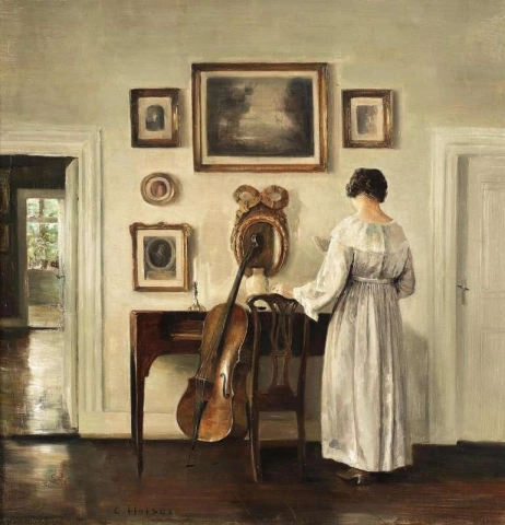 Interior con violonchelo y mujer leyendo