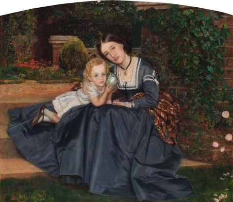 Mutter und Kind sitzen in einem Garten