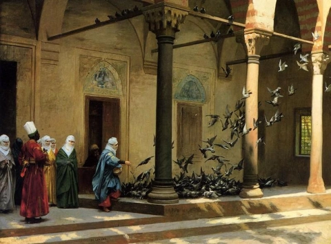 Femmes d'un harem nourrissant des pigeons dans la cour