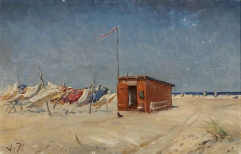 A Beach With Bath Houses And Laundry Drying In The Wind