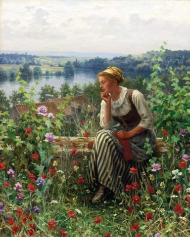 Normandie-Mädchen sitzt in einem Garten