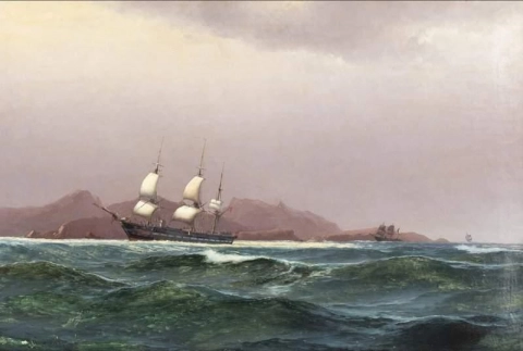 Una fregata danese al largo di una costa rocciosa