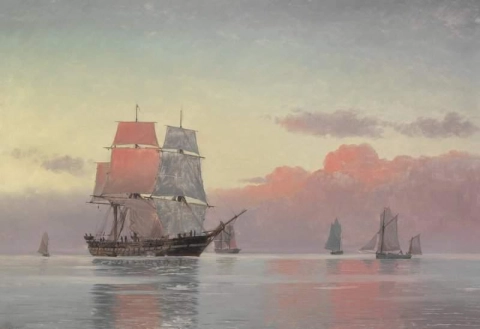 شروق الشمس فوق بحر هادئ مع العديد من السفن الشراعية