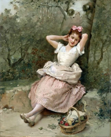 Jente som sitter ved foten av et tre