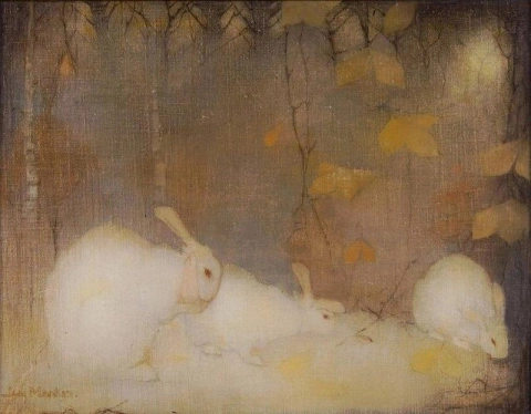 Conejos blancos en el bosque de otoño