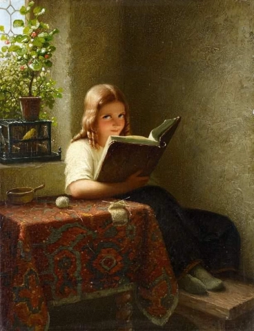 A Young Girl Reading At A Table