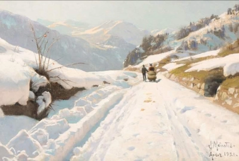 晴れた冬の日にアルデスとシュルスの間の道をスイスのシュクオルから見る