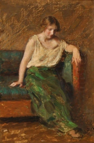 Una modelo femenina sentada en un sofá