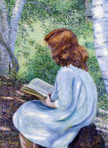 Kind mit rotem Haar beim Lesen