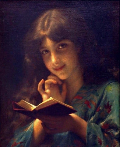 年轻的女孩读一本书