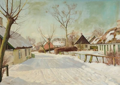 Een besneeuwde dorpsweg