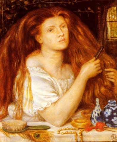 Donna che si pettina i capelli