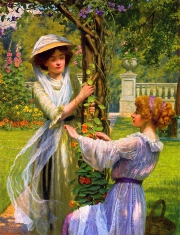 꽃밭에 있는 젊은 여자