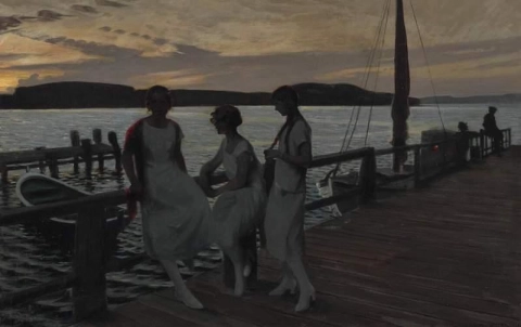Ein Sommerabend mit jungen Frauen auf einem Pier