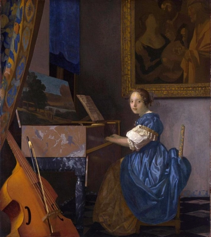 A young woman seated at the virginal
