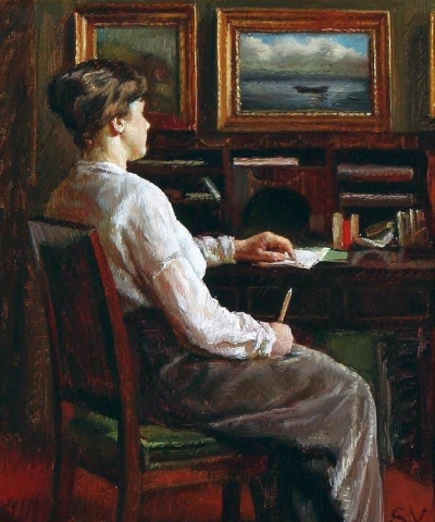 Eine Frau an ihrem Schreibtisch