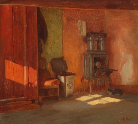 Interior com um gato se aquecendo em um fogão