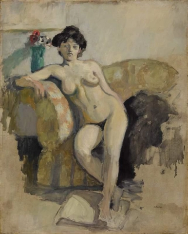 Sittande naken på en soffa ca 1903