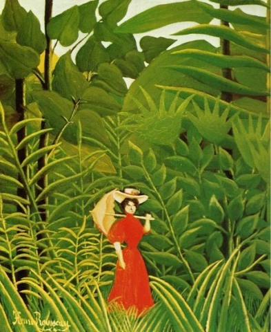 Mujer vestida de rojo en el bosque.