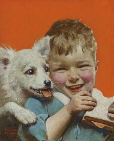 Смеющийся мальчик с сэндвичем и щенком