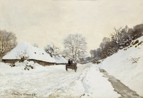 Ein Wagen auf der schneebedeckten Straße mit Saint Simeon Farm