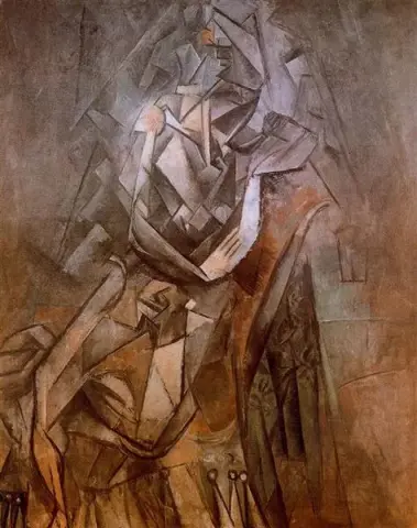 Woman sitting in an armchair