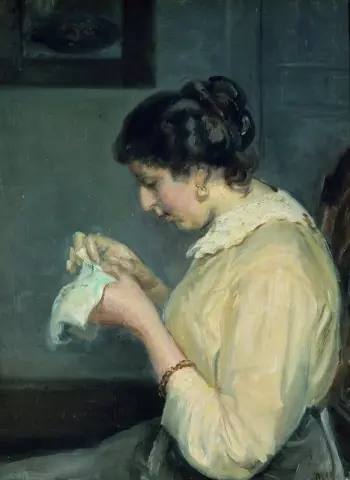 mujer cosiendo